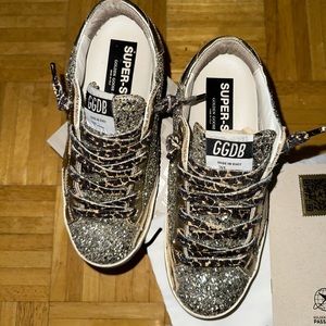 Golden Goose Women's Super-Star in platinum glitter with leather star & heel tab